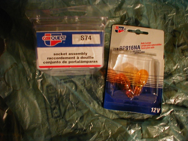 From CarQuest: 
S74 sockets and CLB-BP916NA amber bulbs

Total: $10.31